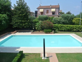view of the pool from the bedroom