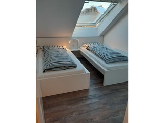 Schlafzimmer mit 2 Einzelbetten