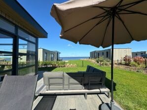Chalet IJsselmeerblick con recinzione e splendida vista sul mare